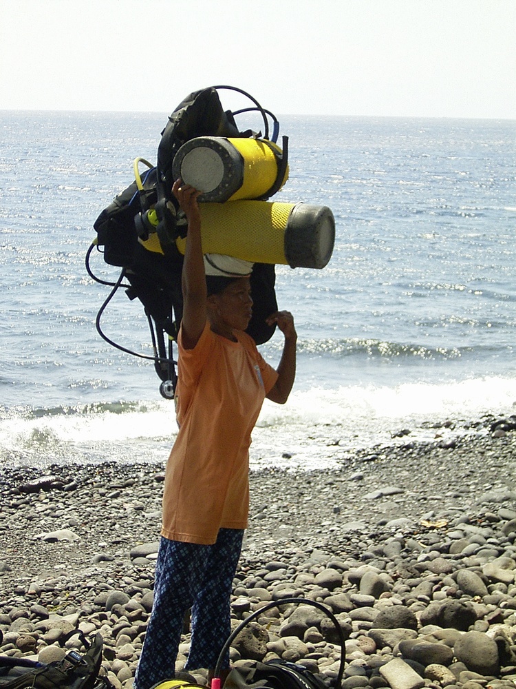 SCUBA help in Bali. Only the women do this