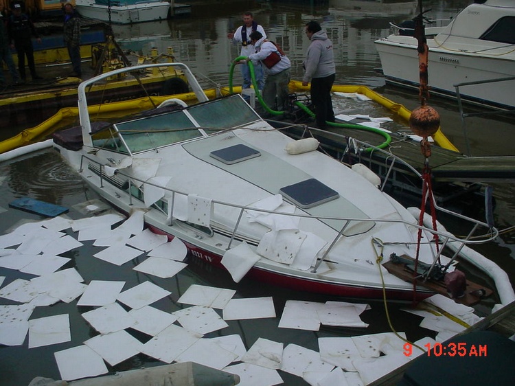 sunken boat in marina gasoline everywhere