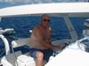 Hugh at helm of Moonshadow BVI, 43` Cat.