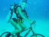 Valentina bicycling underwater in Cayman Islands Oct. 2009