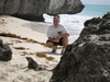 At the base of the Tulum Ruins, on the beach.