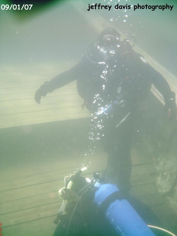 Todd and I on a training platform. My head looks like a blue gill...