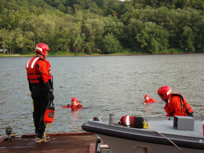 Working with throw bags and dry suits.