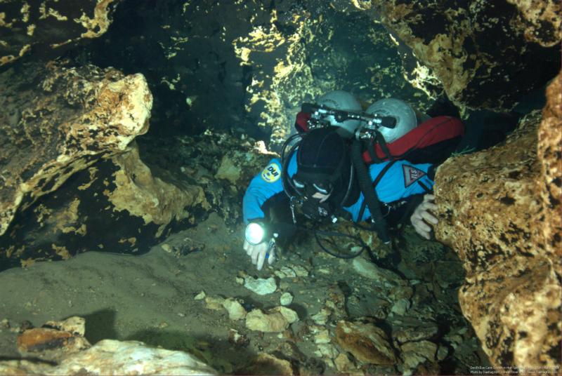 me coming out of a tight hole before an unknown diver silted it out! Photo by Daehag Kim.