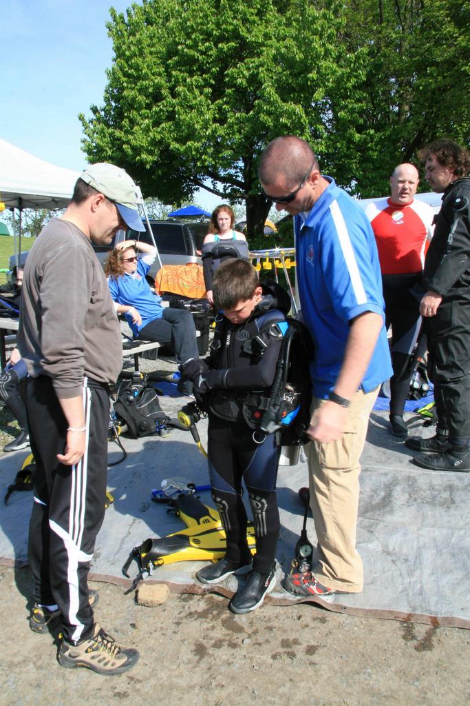 Kevin and I helping Billy Jr doning his gear.  Photo by djones103