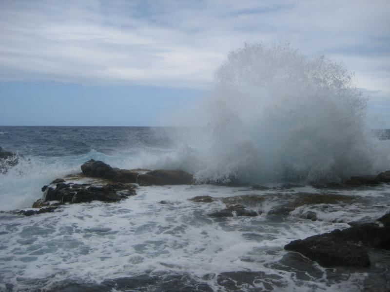 chilling in a big wave. maui.