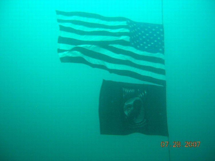 Flags hanging off the Oriskany