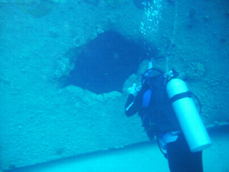 Taking picture of inside of James Bond wreck. Nassau, Bahamas