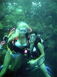 Sunni and Liliana on the famous WHITE BIKINI dive in Roatan Sept. 06