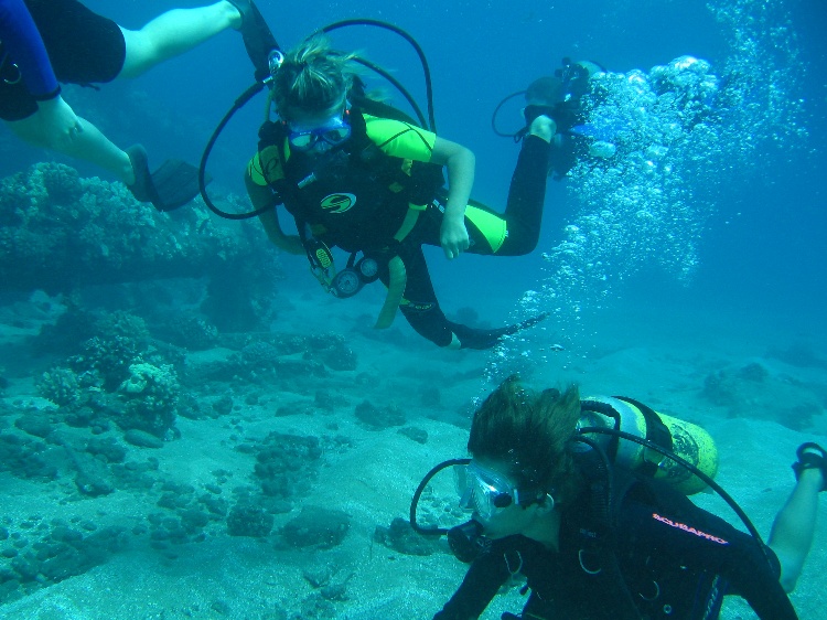 Trevor and Kira, first dive, at Maui and off a boat. Spoiled!