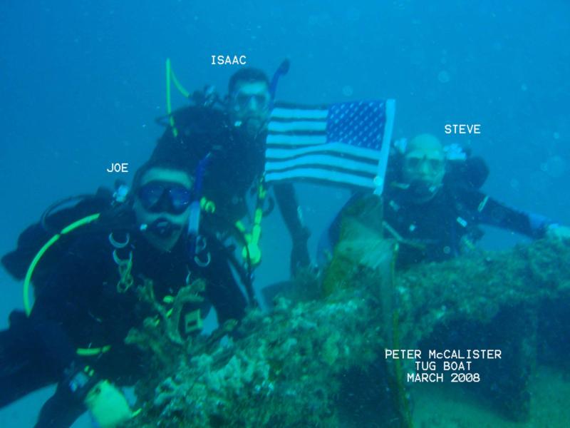 Placing the flag on the tug boat