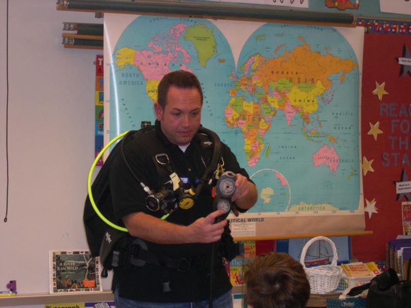 Invited to a school to teach students about scuba