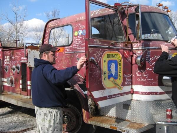 me and danny signing the firetruck at mermet springs il.