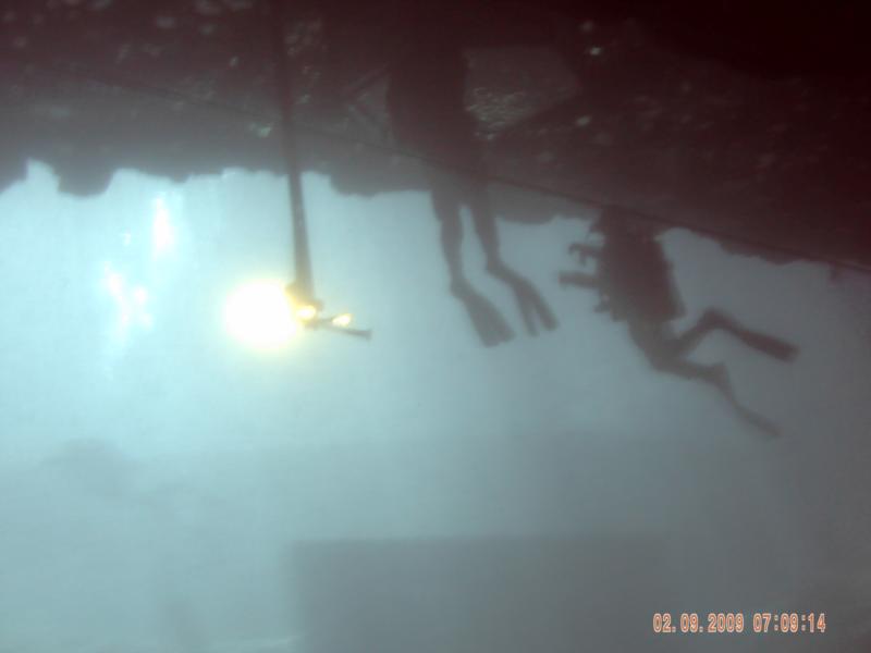 divers in the air bell at blue grotto