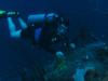 Me on one of the cars at the Car Pile dive site in Curacao