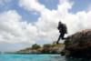 Me, jumping off of Oil Slick, bonaire