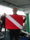 100th dive flag presented by club during Tavernier trip
