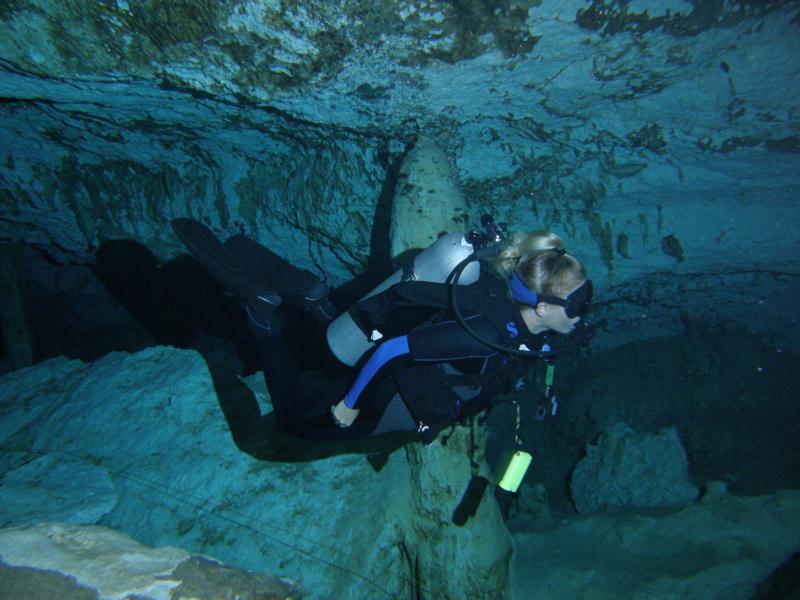 Debbi demonstrating the frog kick which is the suggested kick through the Cenotes