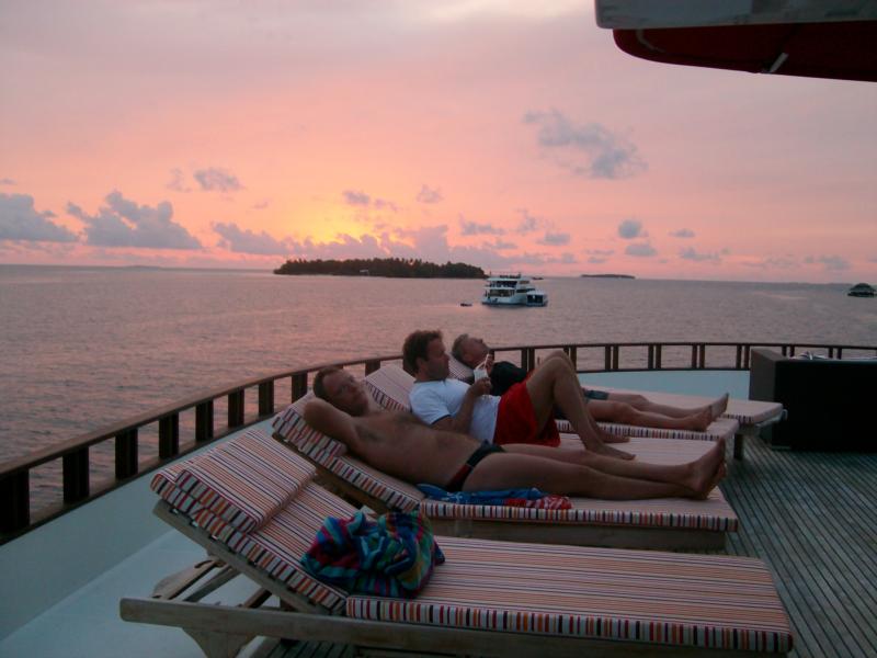 Sunset in the Maldvies on our liveaboard