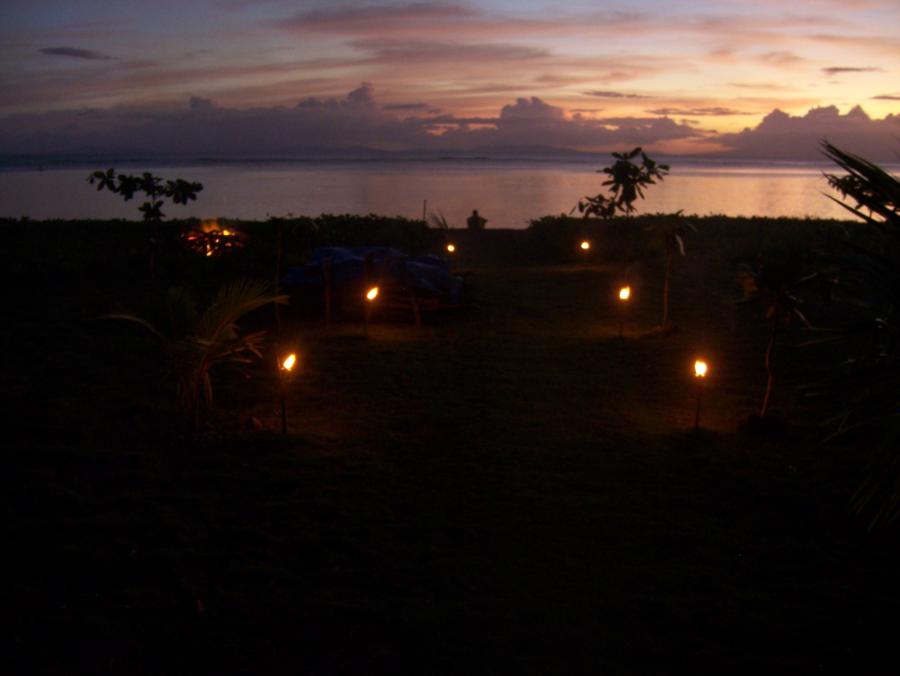 tiki torches leading to the beach