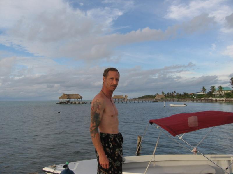 Me with our dive boat in Belize
