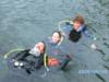 In yogi Bear Pond, a diver tow (me in the middle)