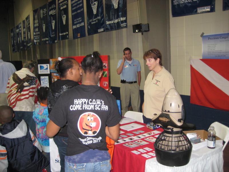 PCD President Debbie Discussing Diving With Booth Visitors