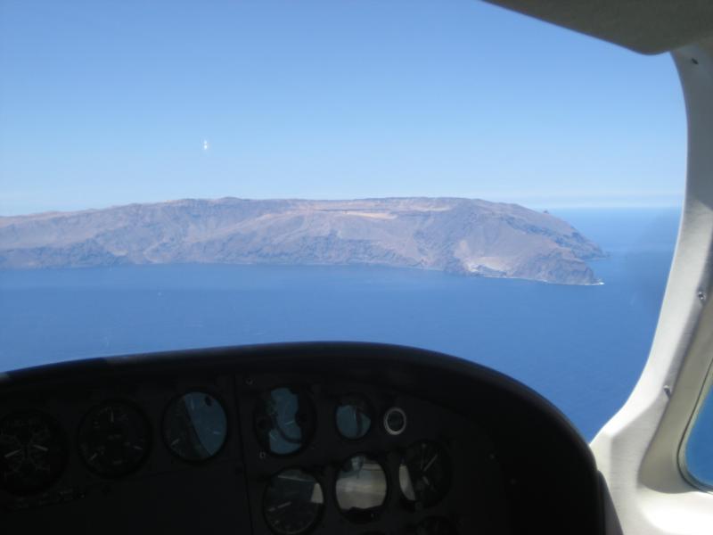 flying in isla guadalupe for white shark expedition with nat geo